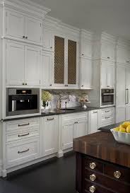 white kitchen with copper hammered prep