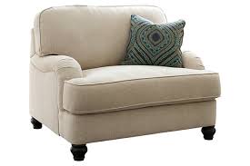 A neutral beige, brown, white, or gray accent chair blends with most color schemes, while dramatic, dark colors like black, purple, red or blue accent chairs add a regal touch and visual intrigue. Harahan Oversized Chair Ashley Furniture Homestore