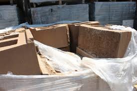 Here, potted grasses in small cinderblocks is chic and cheap. Concrete Cinder Blocks Pop S Discount Building Materials