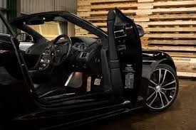 Image result for Jet Black 2011 Aston Martin