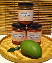 Fresh chillis are pounded together with toasted shrimp paste (belacan) in a stone mortar with added lime and young manggo, creating a more spicy, sour and sweet sambal. Sambal Terasi Mangga Muda Warunglondon