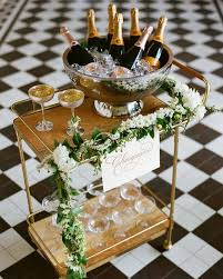 ^^check out the webpage to see more about liquor cart. Great Bar Cart Ideas To Use When Entertaining Decor Steals Blog