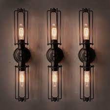 Outdoor sconces work well almost anywhere outside of the home, and in addition to providing exquisite lighting fixtures, they ensure that your paths, steps, and doorways are safely illuminated. Industrial Retro 2 Light Double Head Mini Long Cage Shade Metal Wall Sconce
