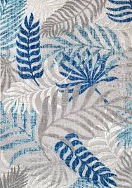 Its tight woven polypropylene construction, as well as contemporary design, makes it the ideal multipurpose rug. Tropics Palm Leaves Indoor Outdoor Area Rug Tropical Outdoor Rugs By Jonathan Y Houzz