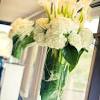 This stem features a soft and flexible ivory lily bloom on a natural green wired stem. 1