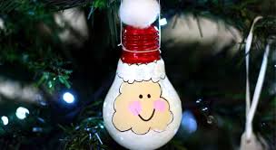 I designed this handmade ornament myself. Christmas Craft For Kids Upcycled Light Bulb Santas Play Cbc Parents