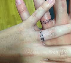 Wedding Ring Tattoo Motives Romantic Ideas For Married Couples Tattoo Wedding Rings Wedding Ring Tattoo Ring Tattoos