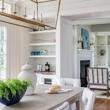 Note the shape of the rods with which it is formed. Antique Brass Linear Chandeliers Design Ideas