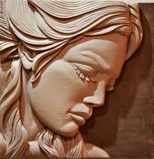 Carved from a 1”x1”x7” piece of basswood.