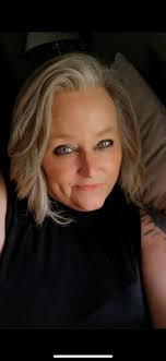 The woman lost her daughter. The girl in the middle. She passed away when  she was ten years old. The girls birthday is coming up and , although it's  been many years