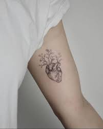 Flower of life tattoos are meaningfully tranquil adornments that will dramatically expand any man's fashionable horizons. Anatomical Heart And Flowers Tattoo