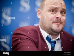 Portrait of Al Murray 'The Pub landlord' promoting his book Pub Quiz at  WHSmiths Manchester Arndale Stock Photo