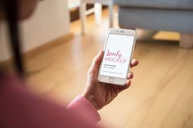 Woman Using A White Iphone In Living Room Mockup Lovely Mockups White Iphone Iphone Used Iphone