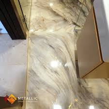 A Gorgeous Marble Like Design With Gold Veins On A Mixed Beige Base Sprucing Up This Guest Bathroom Metallic Epoxy Basement Design Epoxy Floor Floor Design