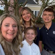 Junior high softball team extends record to 12-2