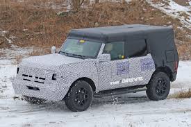 First Photos Of Real 2021 Ford Bronco Appear To Confirm Removable Doors Roof The Drive In 2020 Ford Bronco Ford Bronco Concept Bronco