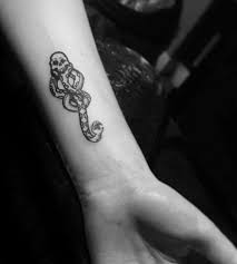 Pin By Leticia Gaylor On Tattoos Piercings Dark Mark Tattoos Slytherin Tattoo Mark Tattoo