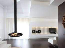 It's mostly because they get to stand out thanks to their positioning in the room. 15 Hanging And Freestanding Fireplaces To Keep You Warm This Winter Freestanding Fireplace Focus Fireplaces Hanging Fireplace
