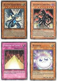 Cards are listed, ordered first by card type and then by appearance. Yugioh Blue Eyes Shining Dragon Sorcerer Of Dark Magic Watapon Pyramid Of Light