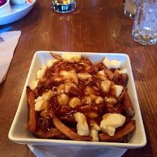 A dish consisting of french fries and fresh cheese curds topped with hot gravy. I Ate Traditional Quebec Poutinehttps I Redd It Pdjzpygvqzh01 Jpg Food Foodie Yummy Food