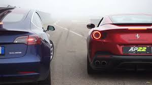 A Drag Race Battle Between Tesla Model 3 Performance And Ferrari Portofino In 2020 Tesla Model Tesla Drag Race