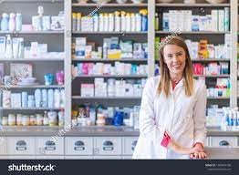 Medicine Pharmaceutics Healthcare And People Concept Portrait Of A Happy Female Pharmacist Cheerful Pharmacist Chemist Woman Pharmacy Decor People Portrait