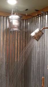 The Small Bucket Is A Shower Head The Large One Is A Rain Head With A Pull Valve You Can See The Video Rustic Shower Rustic Bathrooms Rustic Bathroom Designs