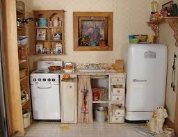 Modern furniture is all well and good in a child's dollhouse, but you can't beat a classic look for a this fabulous set of dollhouse furniture includes a tiled kitchen table and two chairs, sink and. Miniature Kitchen Scene 1 12 Scale Miniature Miniature Kitchen Dollhouse Kitchen Dolls House Interiors