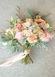 Fall is an absolutely stunning time of year (the most stunning one for most people, thanks to its beautiful colors), and it is definitely one of the best times to get married. Bridal Bouquet Peach Carnations Quicksand Roses White Majolica Spray Roses Lisianthus Pe Purple Wedding Flowers Pink Wedding Flowers Peach Wedding Flowers