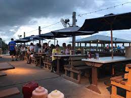 Maybe you would like to learn more about one of these? Picnic Style Dining Outdoors With A Storm Rolling In At J B S Fish Camp Picture Of J B S Fish Camp Restaurant New Smyrna Beach Tripadvisor