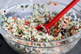 Cauliflower couscous salad with dates, parsley, and almonds is a delicious and nutritious new and fun way to enjoy cauliflower! Raw Cauliflower Couscous Tasty Kitchen Blog