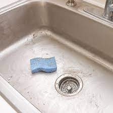 Once the stains are completely removed, rinse the sink with warm water. How To Clean Your Stainless Steel Sink Popsugar Smart Living