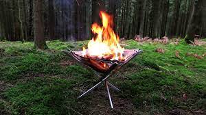 This portable outdoor fire pit/grill fits in your backpack, making it easy to go from the campsite to the backyard barbecue in no time. Firekorf A Portable Fire Pit Grill And Roasting Spit By By Arnaud Kickstarter