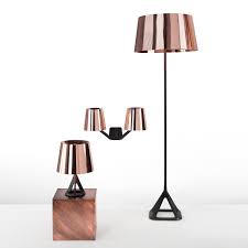 Inspired by the olympic medals referencing to gold metal and bronze. Base Floor Lamp By Tom Dixon In The Shop
