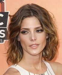 The hair ends with blunted slender slices offers a textured look. Ashley Greene Medium Wavy Chestnut Brunette Hairstyle