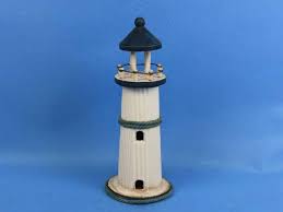 To save your holiday impressions you may decorate one of the rooms with beach or sea details and accessories. Hampton Nautical Wooden Rustic Sea Breen Lighthouse Decoration Decorating Beach Theme 10 10 Handcrafted Nautical Decor Lighthouse 10 3 Home Decor Home Kitchen Stanoc Com