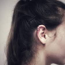 Another common cancer ribbon that is applied as a tattoo. 15 Adorable Ear Tattoos Tiny Tattoos Big Messages