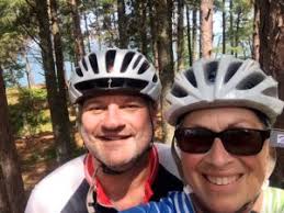 Iowa woman, first female local television sports director in nation, bikes  for climate change.