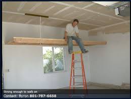I wanted to create a diy garage storage shelf design that was low cost, required minimal cutting, sturdy, safe. Diy Wood Overhead Garage Storage