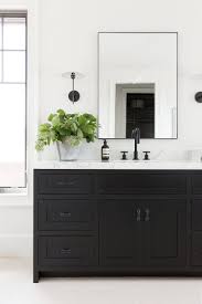 Vanities are also great options if you need ample bathroom storage. Seasonal Powder Room Prep Studio Mcgee Black Vanity Bathroom Black Bathroom Bathroom Inspiration