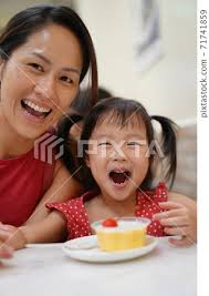 Happy Asian chinese mother and daughter...