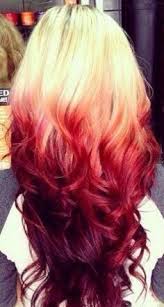 Red and blonde hair colors are a cool twist to the classic blonde hair that incorporates sweet shades of reds and pinks. Blonde Hair With Red Velvet Tips Reverse Ombre Hair Red Ombre Hair Hair Color Red Ombre