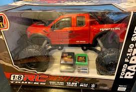 New bright ford f150 rc black hard body shell only 10 long 4 wide. New Bright 1 8 Scale Truck Radio Controlled Ford Raptor 2 4ghz 12 8v Walmart Com Walmart Com