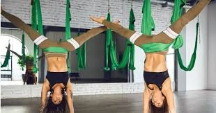11 Essential Aerial Yoga Poses To Learn Today Aerial Yoga Zone Aerial Yoga Poses Yoga Trapeze Poses Aerial Yoga