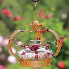 Putting out a hummingbird feeder will definitely help, and these picks are both stylish and functional—designed to draw 10 bird feeders that will bring all the hummingbirds to your yard. Duncraft Com Camelot Bloom Hummingbird Feeder