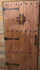 pin by leonardo almada on 家 wine cellar door wooden gate door door gate design