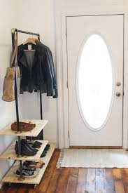 Diy wood clothes rack by house one. 23 Chic And Practical Diy Clothes Racks That Put Your Wardrobe On Display