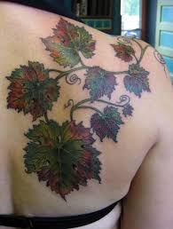 Lily flower with vine and stars tattoo design. 18 Interesting Grape Tattoo Ideas Styleoholic