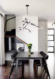 A Contemporary Monochromatic Home In Melbourne By Sisalla Interior Design Dining Room Lighting Interior Design Dining Room Design