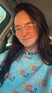 Patsy's Traveling Sweaters group member receives a sweater